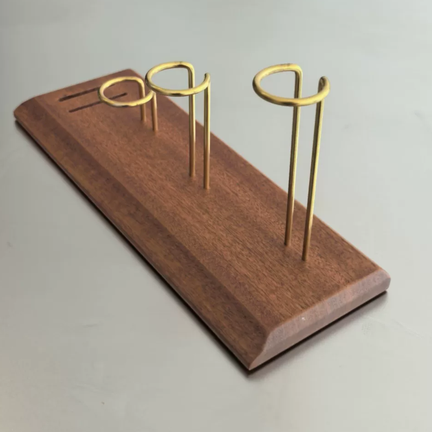 Moka pot drying rack with solid wood base and brass holders for coffee station organisation