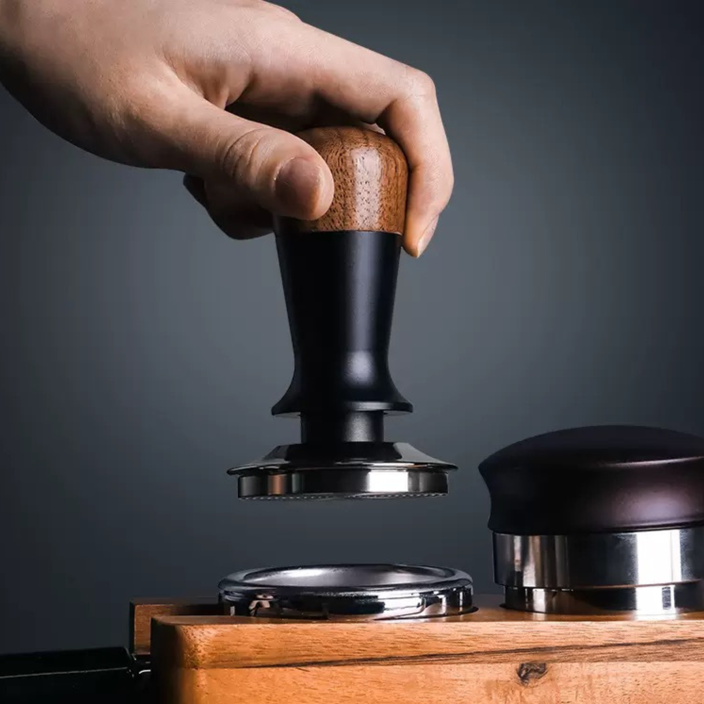 Elegant walnut espresso tamper with ergonomic grip for comfortable and consistent tamping