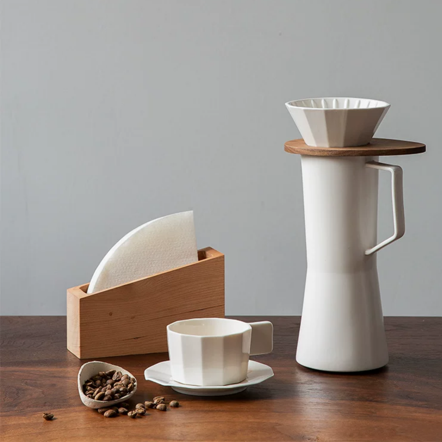 Minimalist V60 coffee filter holder in solid walnut or cherry wood, designed for V01 and V02 pour over filters, handcrafted wooden coffee bar organiser