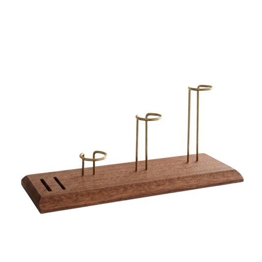 Moka pot drying rack with solid wood base and brass holders for coffee station organisation