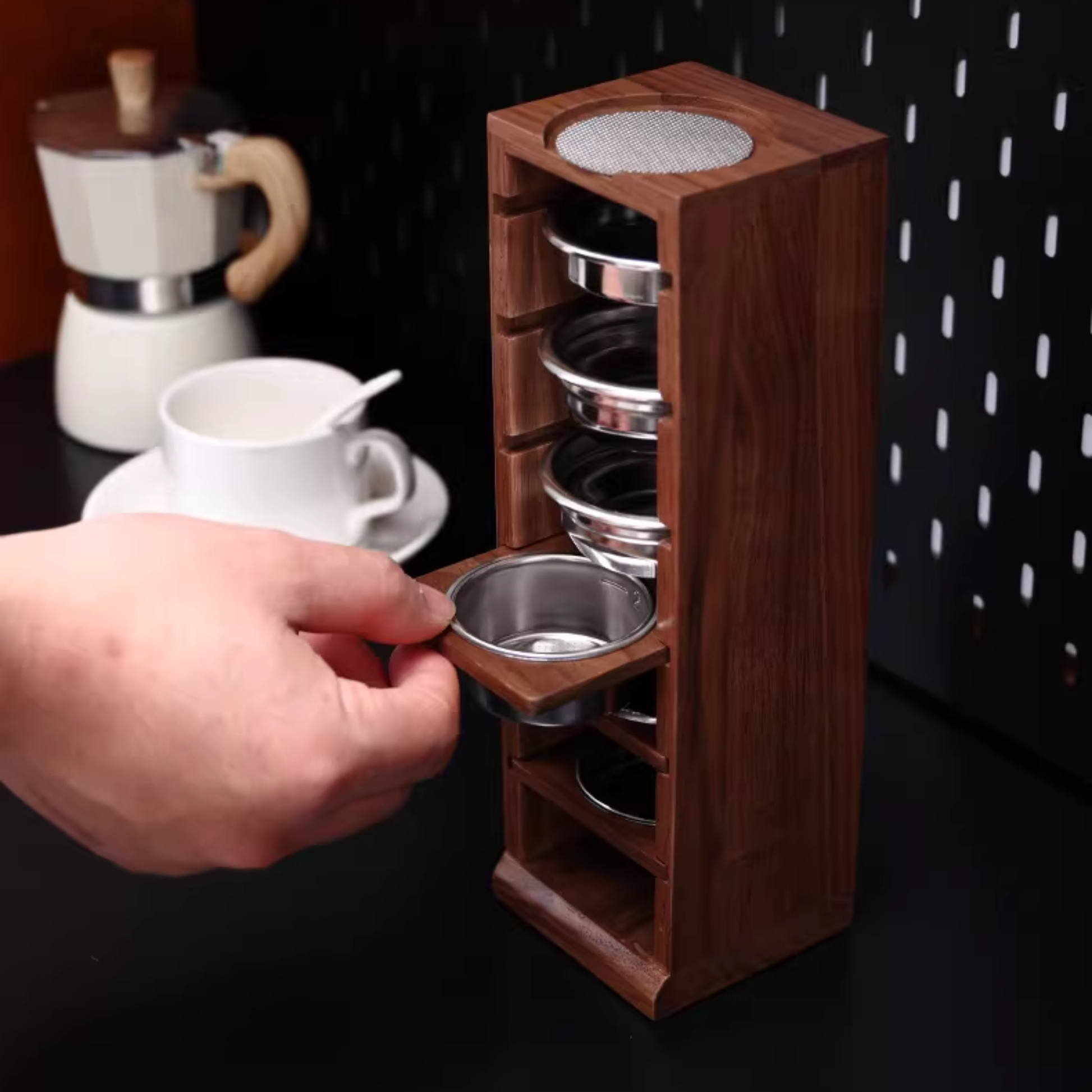 Compact black walnut coffee accessory organiser with space-saving vertical design.