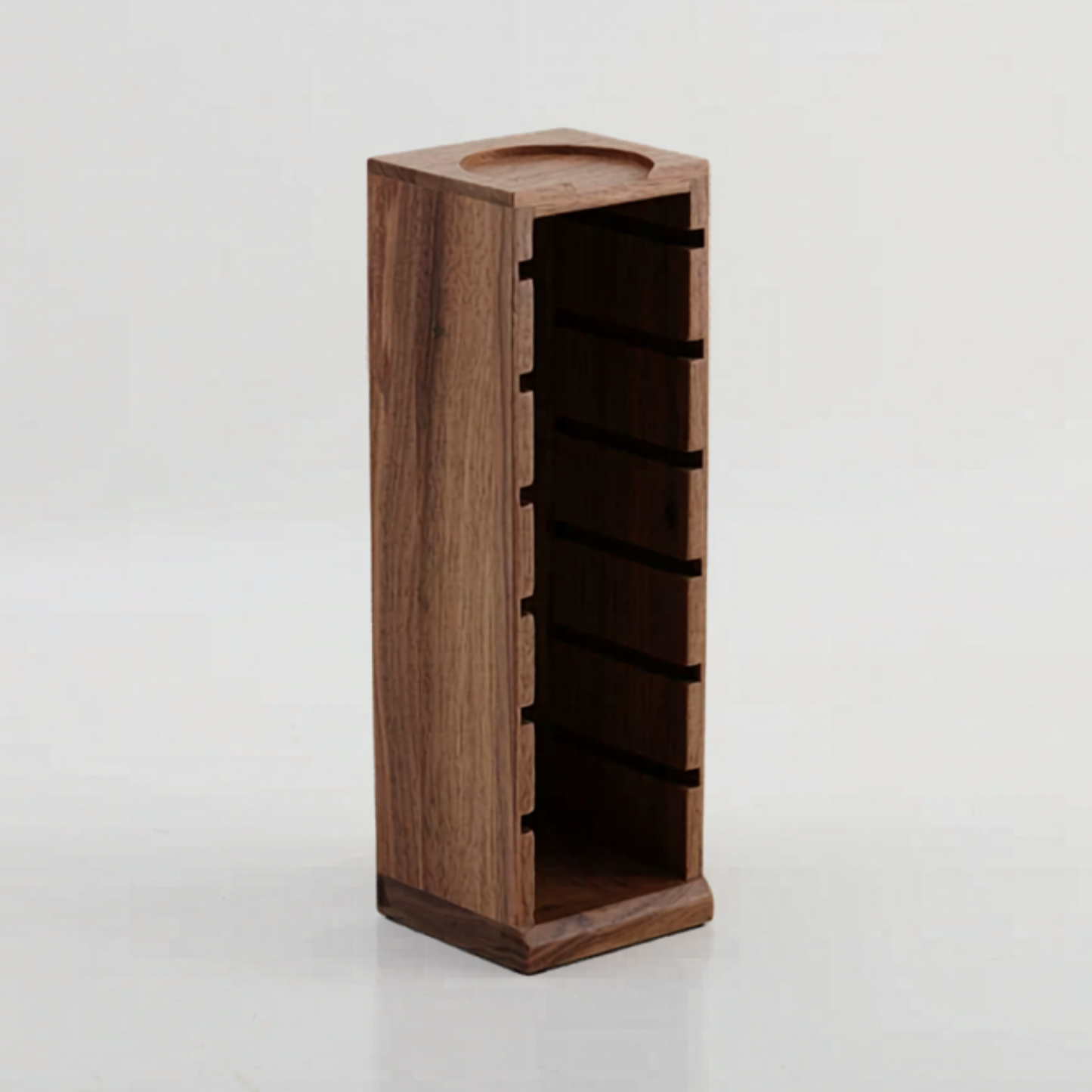 Espresso basket organiser for keeping 58mm, 54mm, 53mm, and 51mm baskets upright.