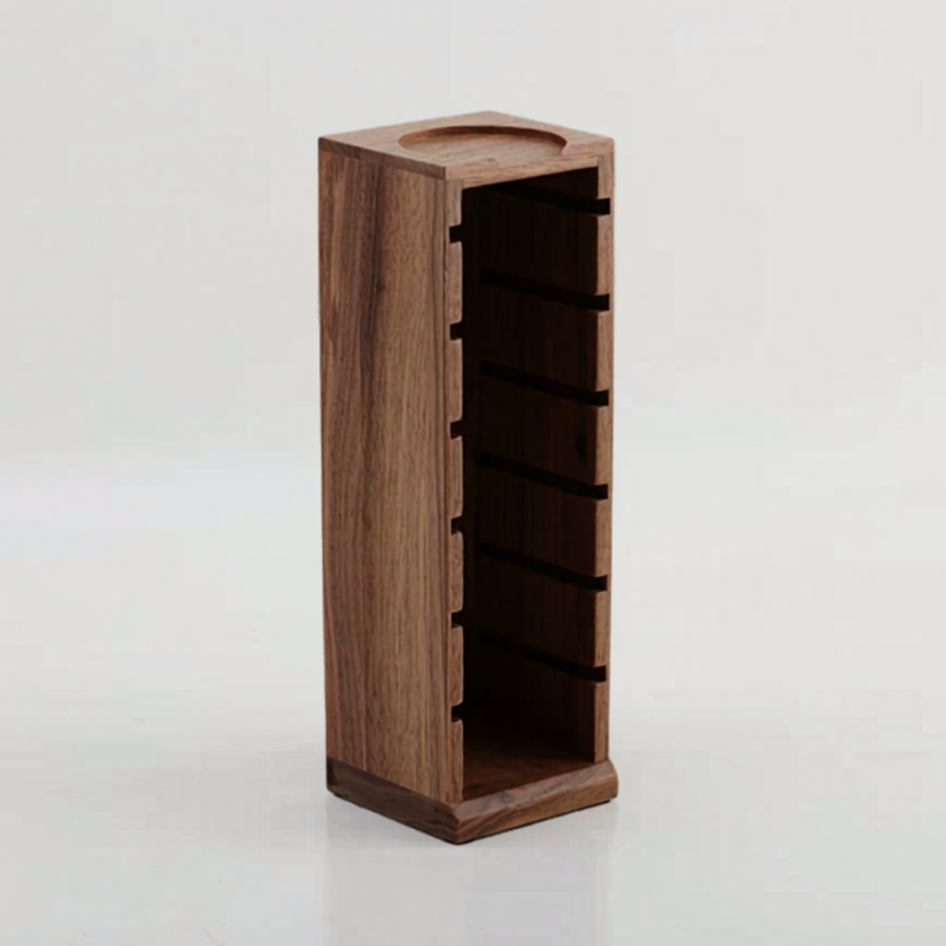 Espresso basket organiser for keeping 58mm, 54mm, 53mm, and 51mm baskets upright.