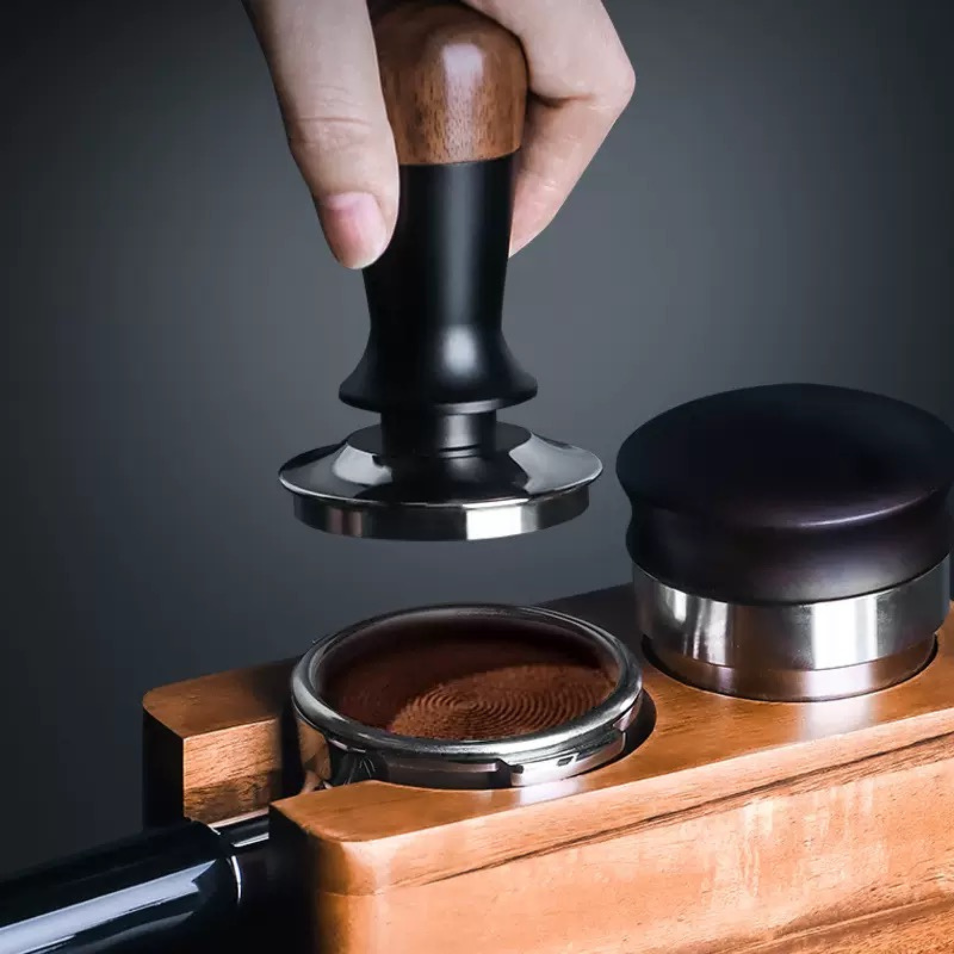 Beginner-friendly espresso tamper with walnut handle and calibrated pressure for even coffee puck compression