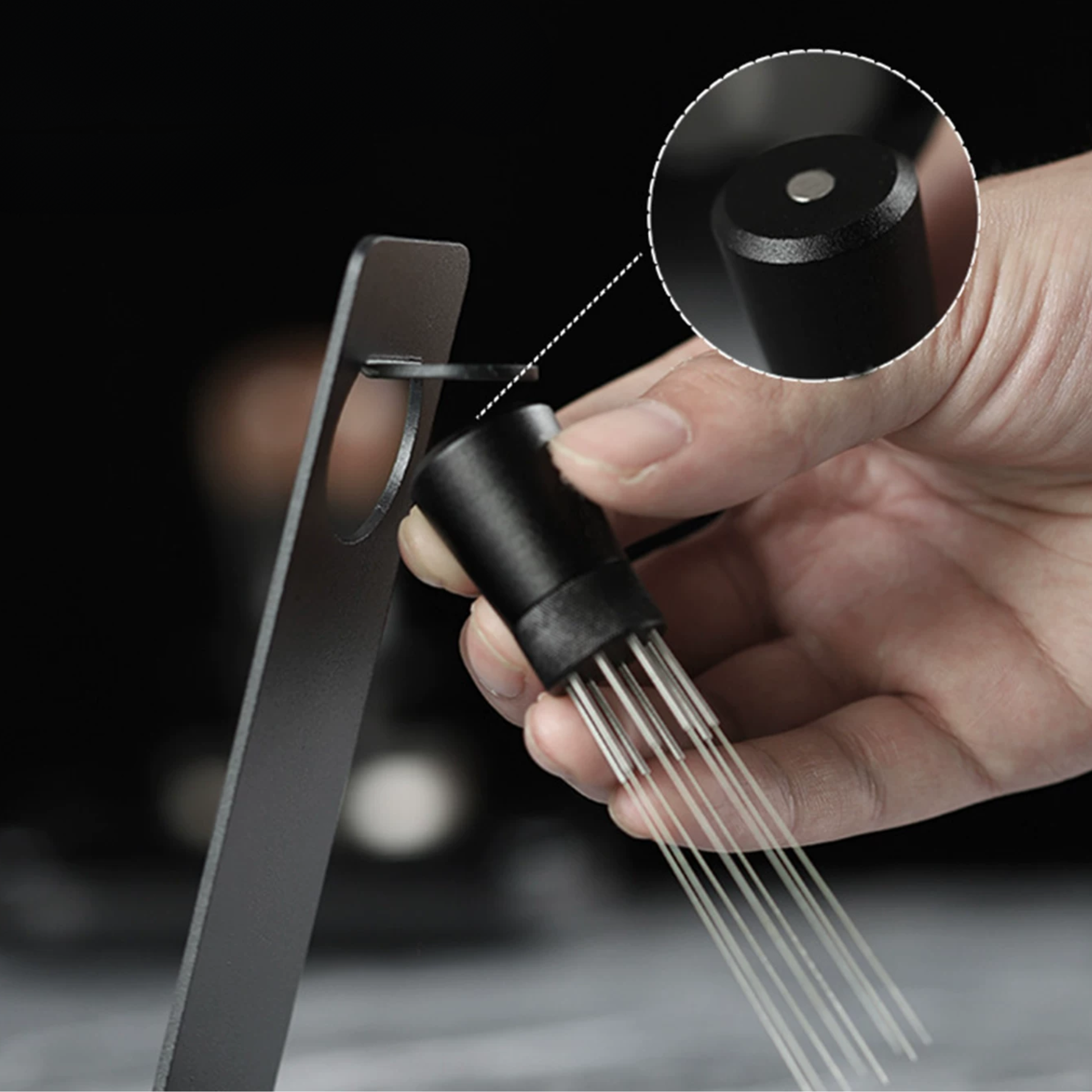 Espresso WDT tool stored securely on a magnetic stand for clean and convenient access