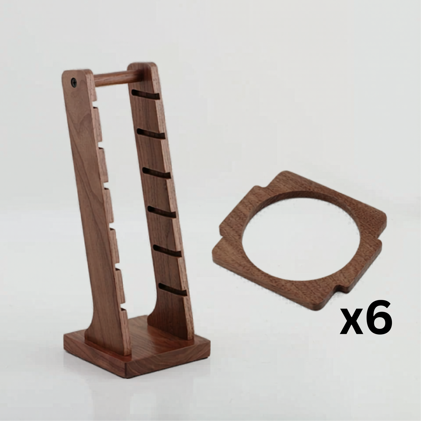 Stylish espresso basket rack with puck screen holder for home coffee bar setup.